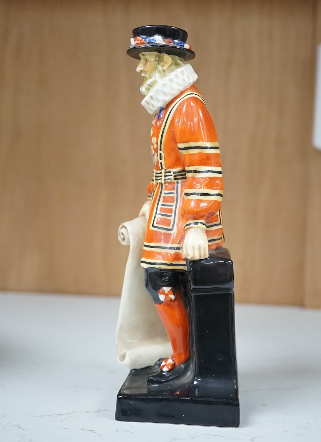 An early Royal Doulton advertising figure, Standing Beefeater, impressed date for 1927, 19cm high. Condition - good, minor hairline to base